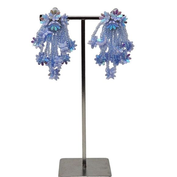 Whimsical iridescent blue beaded flower clip on earrings - Picture 5 of 6